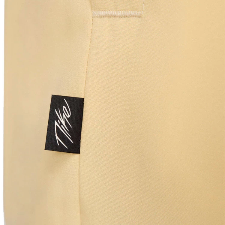 pantalon-largo-nike-dri-fit-woven-icon-team-gold-black-white-black-3