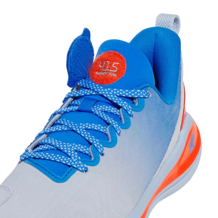 zapatillas-under-armour-curry-12-what-the-bay-nino-blue-calm-blue-atlantis-dark-orange-8